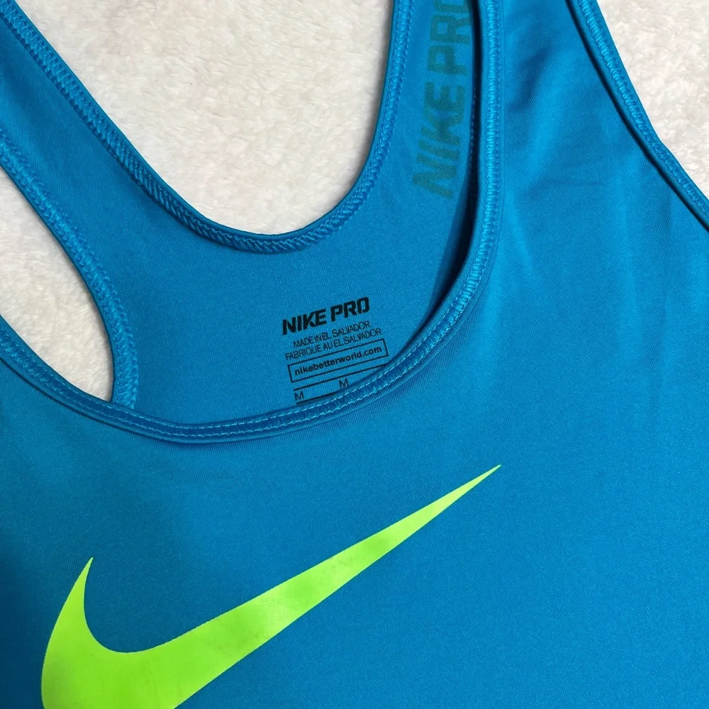 Nike Women’s Teal Tank with Neon Yellow Swoosh
